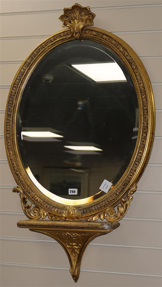 A Victorian oval gilt wall mirror